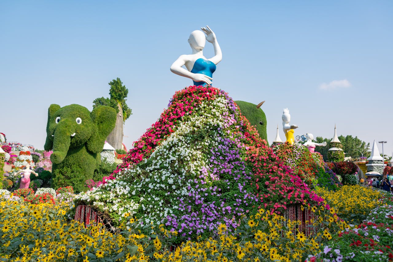 hero-gallery-01 Colorful flower sculptures at the famous Miracle Garden in Dubai. A stunning visual spectacle for tourists.